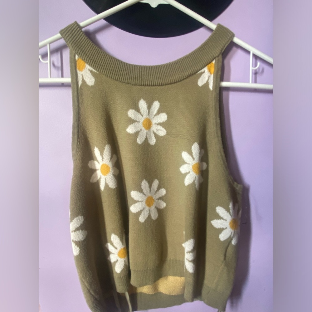 2 tank tops both larges, with green and a brown flowers.